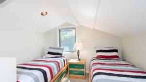 Ένα ή περισσότερα κρεβάτια σε δωμάτιο στο Telluride Lodge 405 by AvantStay Close to Slopes Town