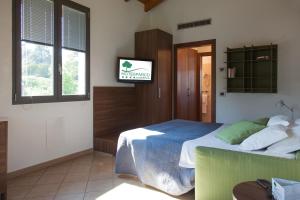 En eller flere senge i et værelse på Residenza Del Parco