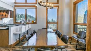 a dining room with a wooden table and chairs at Adams Ranch Retreat by AvantStay Free Shuttle 2 Mountain Village Telluride Ski Resort in Telluride