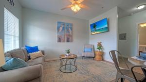 a living room with a couch and a table at The Costa Bahia Condos by AvantStay Pristine Comfort Near Port Aransas Beach in Port Aransas
