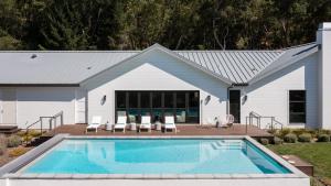 a house with a swimming pool in the yard at Syrah by AvantStay Hilltop Haven in Sonoma Private Pool Patio in Sonoma