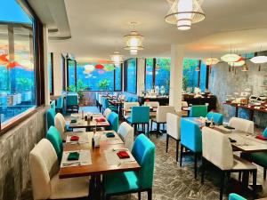 Un restaurant u otro lugar para comer en Happy Life Memories Hoi An Hotel & Spa