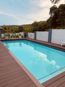 a swimming pool on the roof of a building at Alimu villa in Nelspruit