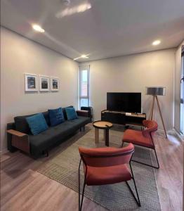 TV a/nebo společenská místnost v ubytování Valhalla Madeira Apartements