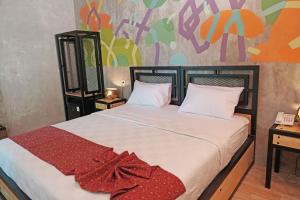 Afbeelding uit fotogalerij van Hotel New Puri Garden in Kalibanteng-lor +23 foto's