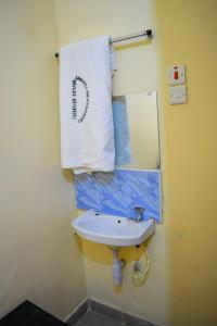 Vonios kambarys apgyvendinimo įstaigoje Saboti Hotel