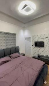 Katil atau katil-katil dalam bilik di Stylish 3Bedroom Duplex in Gaduwa