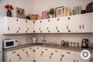 Køkken eller tekøkken på Wijnberg cottage + 12 billeder