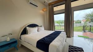 Ένα ή περισσότερα κρεβάτια σε δωμάτιο στο Jawai Retreat