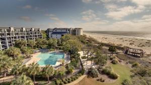 an aerial view of the resort and the beach at 401 A Shipwatch by AvantStay Beachfront Condo w Community Pool Access in Isle of Palms