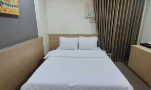 Ένα ή περισσότερα κρεβάτια σε δωμάτιο στο Namyangju Benikea JD Hotel +25 φωτογραφίες