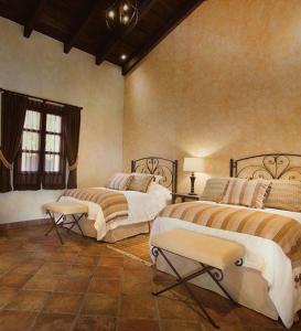 a large bedroom with two beds and a window at Hotel Casa Suwon in Suwon +158 photos