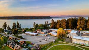 an aerial view of a small town next to a lake at Sunny Backyard Fireplace Coastal Access in Peaceful Neighborhood Near Shopping in Langley