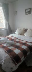 Кровать или кровати в номере Noordzee Blankenberge