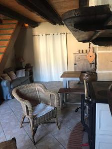 Χώρος καθιστικού στο Le Petit Gîte de Milhac