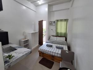 Ένα ή περισσότερα κρεβάτια σε δωμάτιο στο Crissanfranz Building