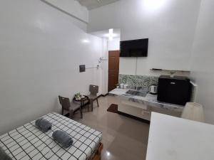 Ένα ή περισσότερα κρεβάτια σε δωμάτιο στο Crissanfranz Building