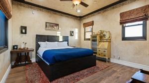 a bedroom with a bed and a dresser in it at 2 Homes in Bella Vista Rd by AvantStay Sleeps 8 Vineyard Views Patios Fireplace in Temecula Wine Trail in Temecula