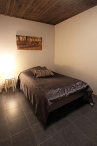 Ένα ή περισσότερα κρεβάτια σε δωμάτιο στο Himoskunkku +6 φωτογραφίες