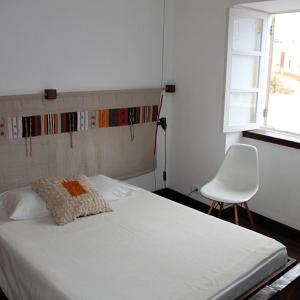 Postel nebo postele na pokoji v ubytování Casa Café Mindelo
