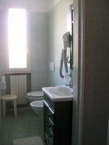 Koupelna v ubytování Hotel Sole