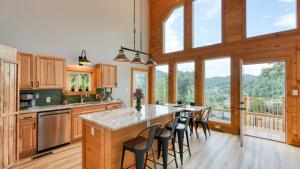 Una cocina o cocineta en Hot Tub Game Room Views Near Downtown Gatlinburg Perfect Too by AvantStay