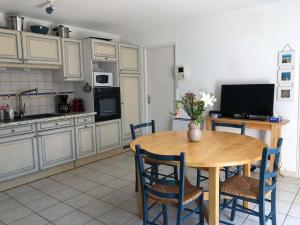 Køkken eller tekøkken på L’Oasis de la Parée Bretignolles