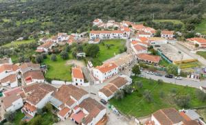 an aerial view of a small village with houses at Casas Rurales Los Montes in La Corte