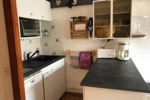 Kuchyň nebo kuchyňský kout v ubytování Apartment With Balcony Near The Slopes + 5 fotografií