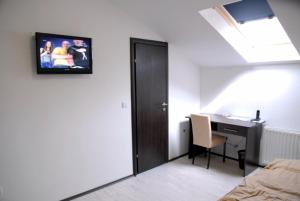 TV a/nebo společenská místnost v ubytování Rooms Levicki