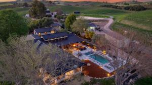 an aerial view of a home with a swimming pool at Wine Country Estate w Pool Hot Tub The Residence at Truss Wines by AvantStay in Paso Robles