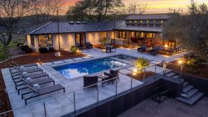 an aerial view of a house with a swimming pool at Wine Country Estate w Pool Hot Tub The Residence at Truss Wines by AvantStay in Paso Robles