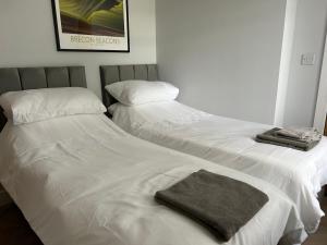 Postel nebo postele na pokoji v ubytování The Loft