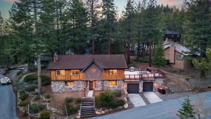 an aerial view of a house in the woods at Geraldine Drive by AvantStay Hot Tub Views Walk to Trails Game Room in Incline Village