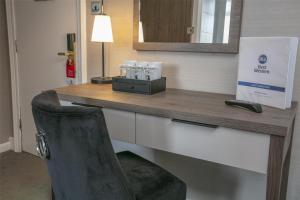 a desk with a chair in a room at Best Western New Kent Hotel in Newcastle upon Tyne