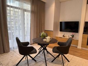 TV a/nebo společenská místnost v ubytování Modern spaces Boulevard