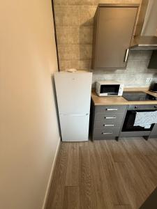 Kuchyň nebo kuchyňský kout v ubytování Harbour Haven by Decent Properties