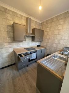 Kuchyň nebo kuchyňský kout v ubytování Harbour Haven by Decent Properties