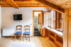 Μια τηλεόραση ή/και κέντρο ψυχαγωγίας στο PENSION CASA MIÑO