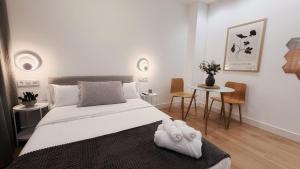Una cama o camas en una habitación de Viar Fika Studios