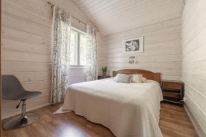 Postel nebo postele na pokoji v ubytování Karkutahko Villas 1A - Spacious 3BR Villa in Tahko with Private Sauna