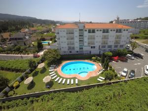 Bazén v ubytování Hotel Turimar nebo v jeho okolí + 16 fotografií