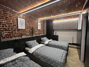 Ένα ή περισσότερα κρεβάτια σε δωμάτιο στο Limba Home