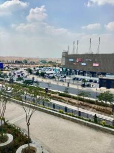 a view of a parking lot with a marina at 90 New Cairo - Full Services Apartments in Cairo