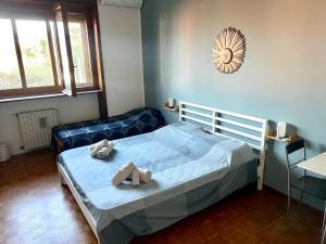 Ένα ή περισσότερα κρεβάτια σε δωμάτιο στο IEO Benvenuti da Tomas & Anna +6 φωτογραφίες