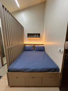 Ένα ή περισσότερα κρεβάτια σε δωμάτιο στο Apartamento Loft 3 próximo ao Shopping