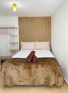 Katil atau katil-katil dalam bilik di Lena Homes Jaén