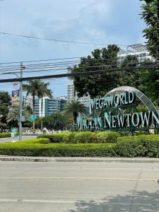 Imagen de la galería de Affordable 2BR Near Airport with WiFi, Netflix and Pool, en Mactan