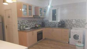 Kuchyň nebo kuchyňský kout v ubytování Villa d'Emma