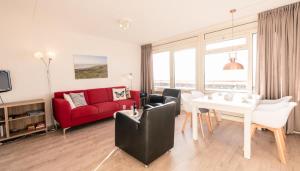 Χώρος καθιστικού στο Waddenzicht 71 Ameland - tolle FerienwWohnung mit großer Dachterrasse für bis zu 4 Personen - Haustiere herzlich willkommen, strandnah
